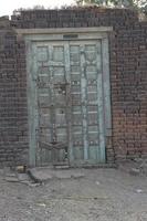 door with window with wood background photo