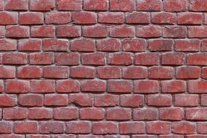 Red old brick wall. Interesting texture or background. photo