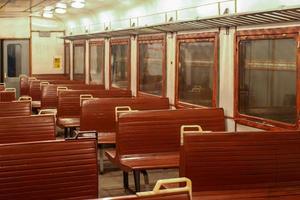 Empty train car and seats without passengers. photo