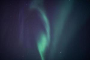 Northern lights, Aurora borealis in the night sky photo