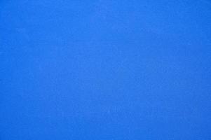 Campo de caucho sintético azul de la cancha de tenis foto