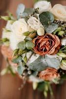 elegant wedding bouquet of fresh natural flowers photo