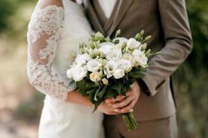 elegant wedding bouquet of fresh natural flowers photo