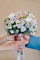 elegant wedding bouquet of fresh natural flowers photo