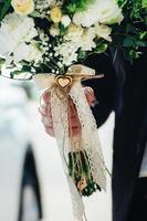 elegant wedding bouquet of fresh natural flowers photo