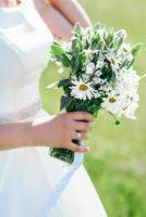 elegant wedding bouquet of fresh natural flowers photo