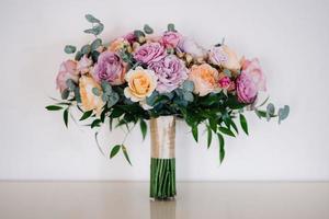 elegant wedding bouquet of fresh natural flowers photo