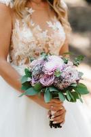 elegant wedding bouquet of fresh natural flowers photo