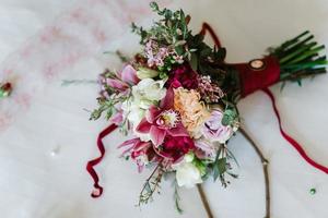 elegant wedding bouquet of fresh natural flowers photo