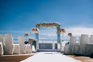 wedding decorations and a wedding arch for the ceremony photo