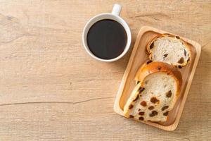 Raisin bread with coffee cup for breakfast photo