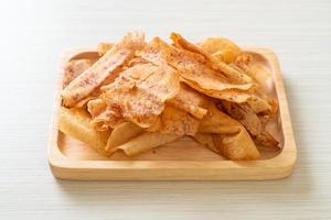 Taro Chips - fried or baked sliced taro photo