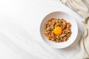 Salmon fried rice with pickled egg on top - Asian food style photo