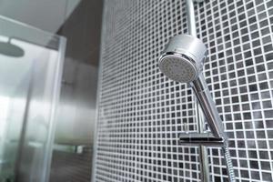 Close-up shower head in bathroom photo