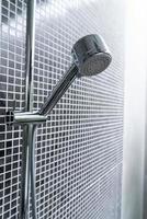 Close-up shower head in bathroom photo