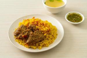 Beef Biryani or Curried rice and beef - Thai-Muslim version of Indian biryani, with fragrant yellow rice and beef photo