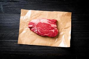 Fresh raw beef steak or raw meat photo