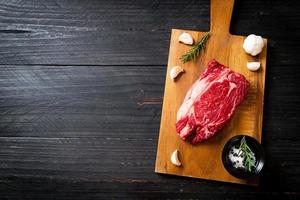 Fresh raw beef steak or raw meat photo