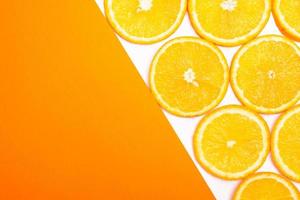 Orange fruit pattern composition. Summer healthy food background.