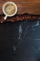 Cup of coffee on table wooden table photo