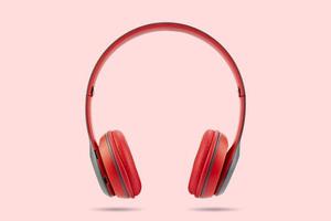 Modern design of red color wireless earphone isolated photo
