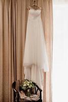 perfect white wedding dress on the wedding day photo