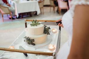 wedding cake at the wedding of the newlyweds photo