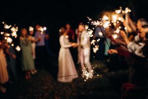 sparklers at the wedding,  on the background photo