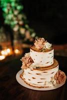 wedding cake at the wedding of the newlyweds photo