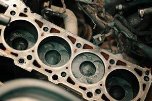 Pistons and cylinder head of engine block vehicle photo