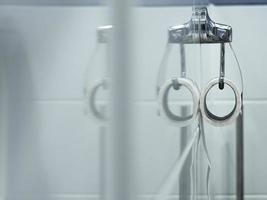 A white roll of soft toilet paper hangs photo