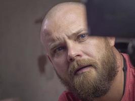 Portrait of a bald man with a beard photo