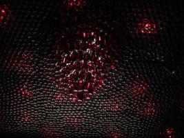 many bottles with red liquid hang on the ceiling for decoration. chic decor photo