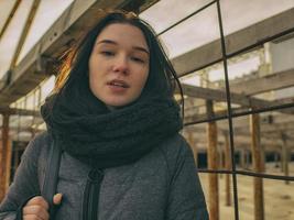 portrait of a girl on the background of metal rusty designs photo