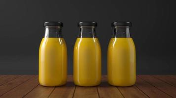 botella de vidrio de jugo de naranja. foto