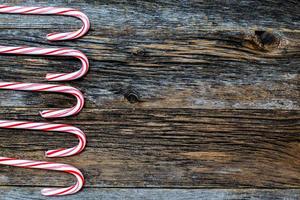 Rustic wood with candy canes background