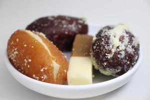 tasty multiple sweet stock on plate photo