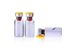 Bottle Vial of Covid19 Coronavirus Vaccine isolated on a white background photo