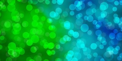 Light Blue, Green vector background with spots.