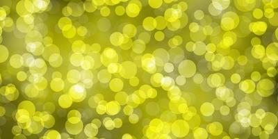 Light Yellow vector backdrop with dots.