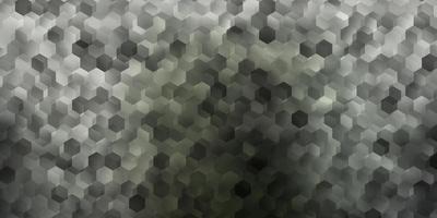 Fondo de vector gris claro con formas hexagonales.