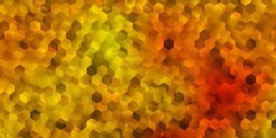 Dark yellow vector backdrop with chaotic shapes.