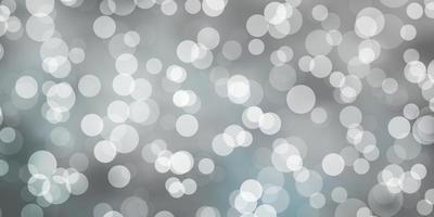 Light BLUE vector background with bubbles.