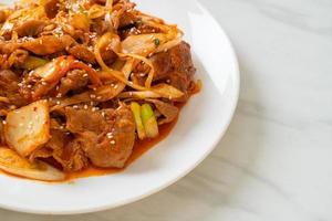 Stir-fried pork with Korean spicy paste and kimchi - Korean food style photo