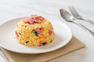 Homemnade fried rice with ham on plate photo