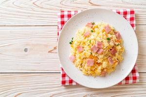 Homemnade fried rice with ham on plate photo