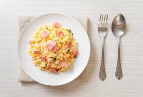 Homemnade fried rice with ham on plate photo