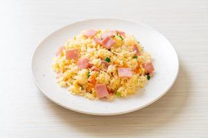 Homemnade fried rice with ham on plate photo