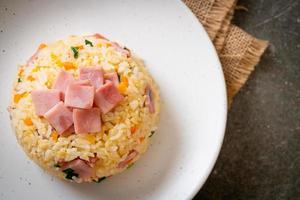 Homemnade fried rice with ham on plate photo