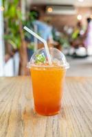 Iced lemon tea glass in coffee shop cafe and restaurant photo